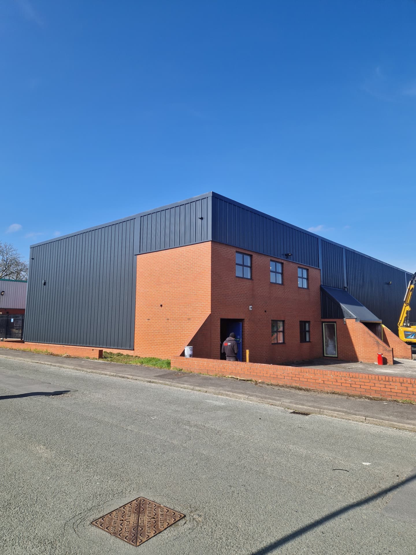 Company-supplied photograph of the completed X Martial Arts building in York with RAL 7016 anthracite grey cladding