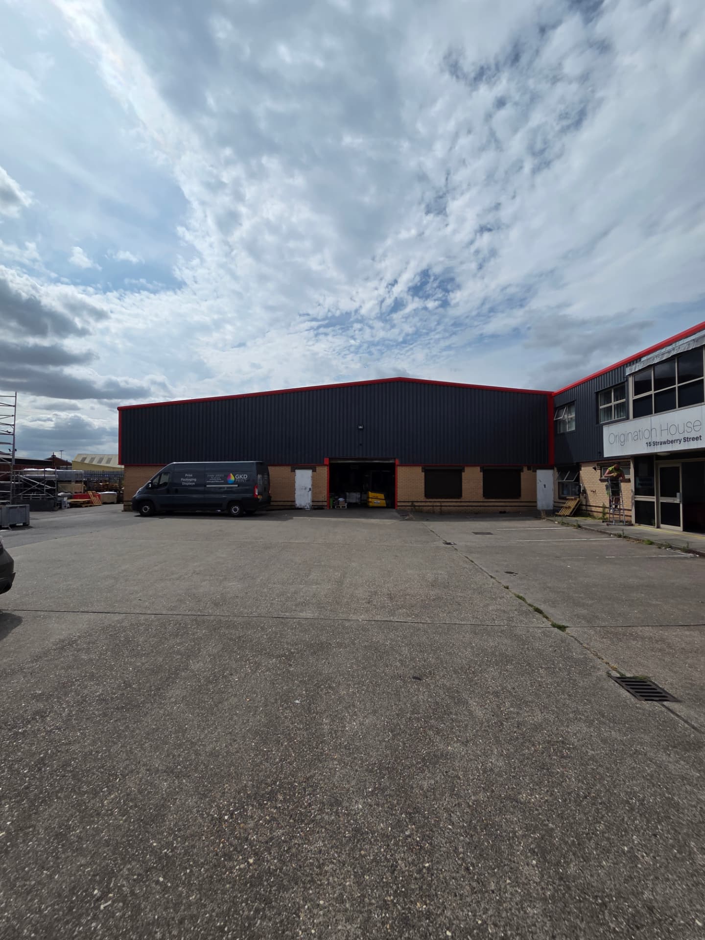 Company-supplied photograph of the resprayed Hull industrial unit across the courtyard