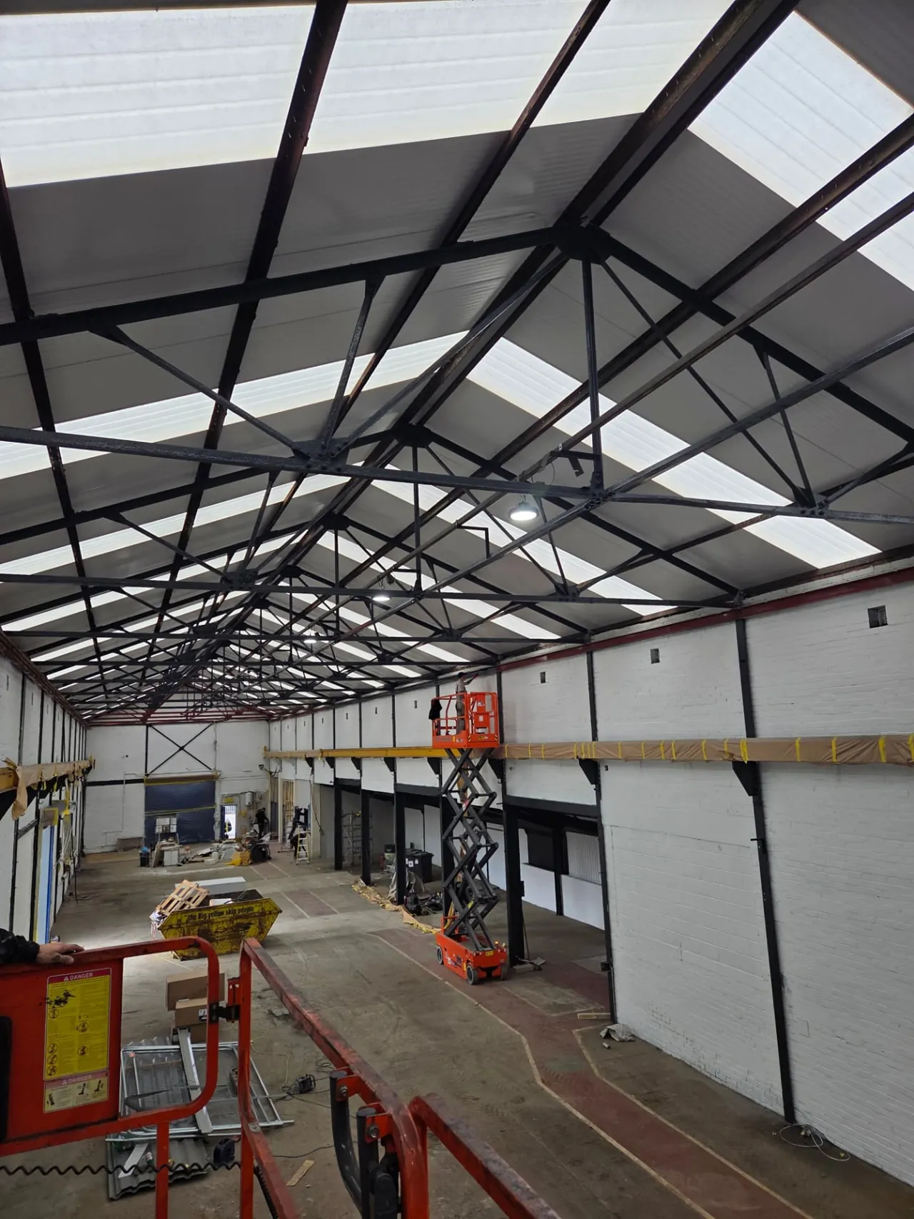 Company-supplied photograph of the Wakefield warehouse roof structure after recoating