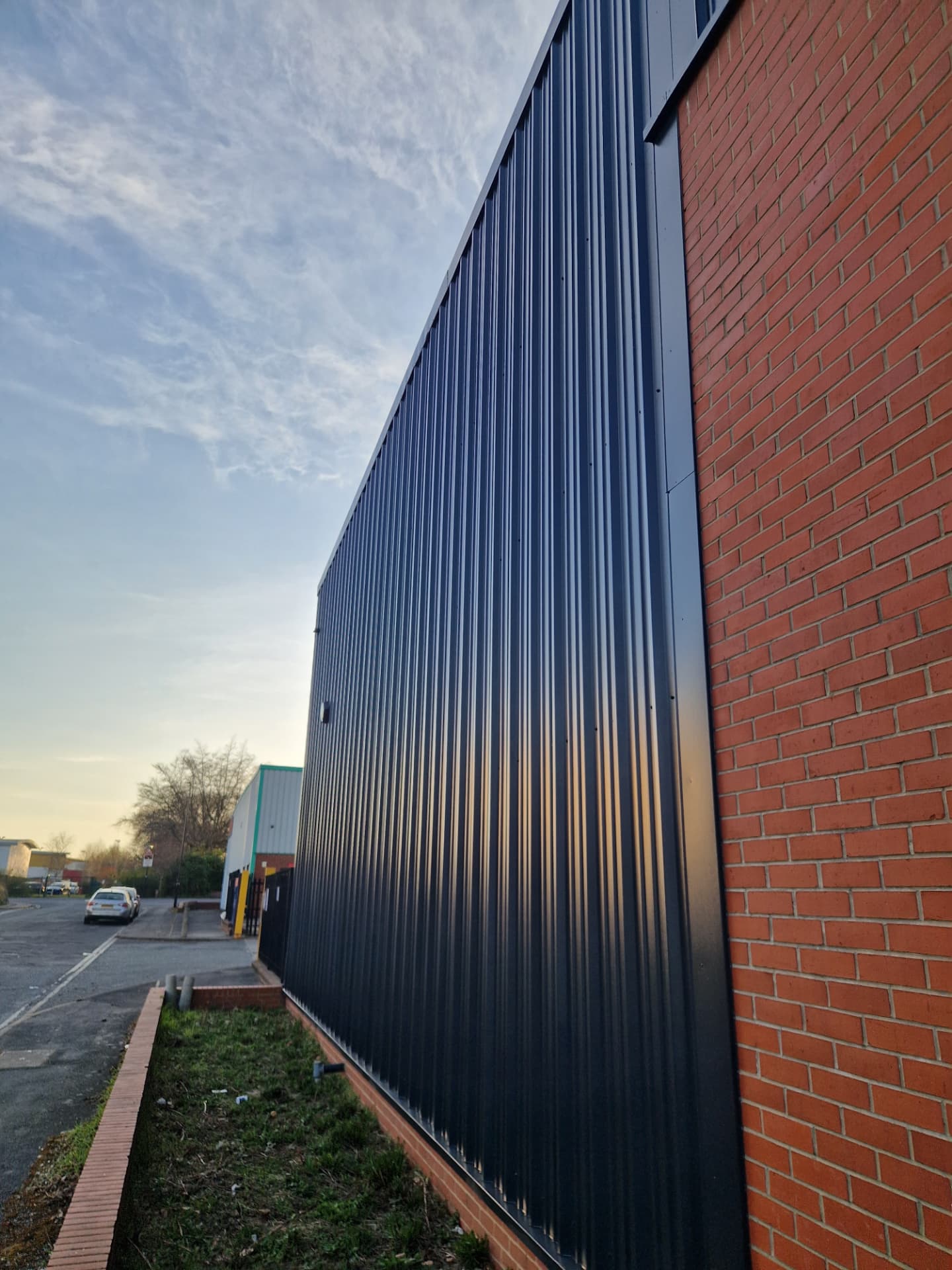 Company-supplied photograph of the completed X Martial Arts cladding along the side of the building