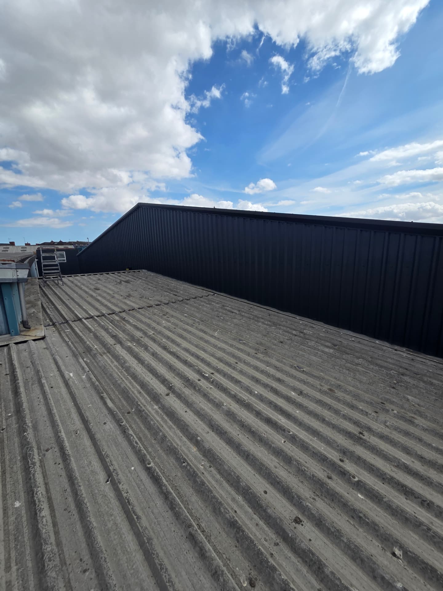Company-supplied photograph of the completed anthracite grey cladding seen from the roof