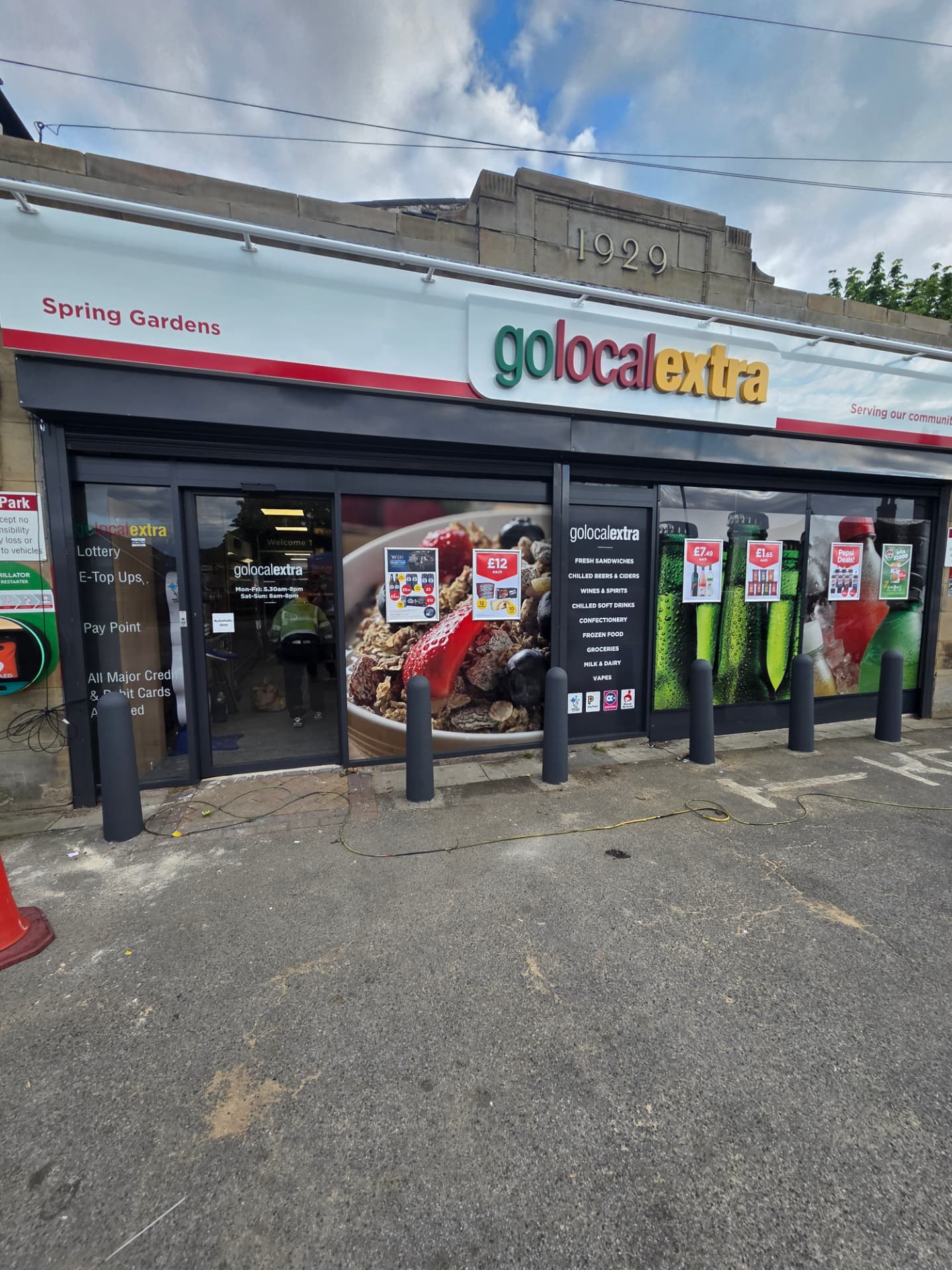 Company-supplied Go Local shopfront photograph with resprayed black frontage and fascia