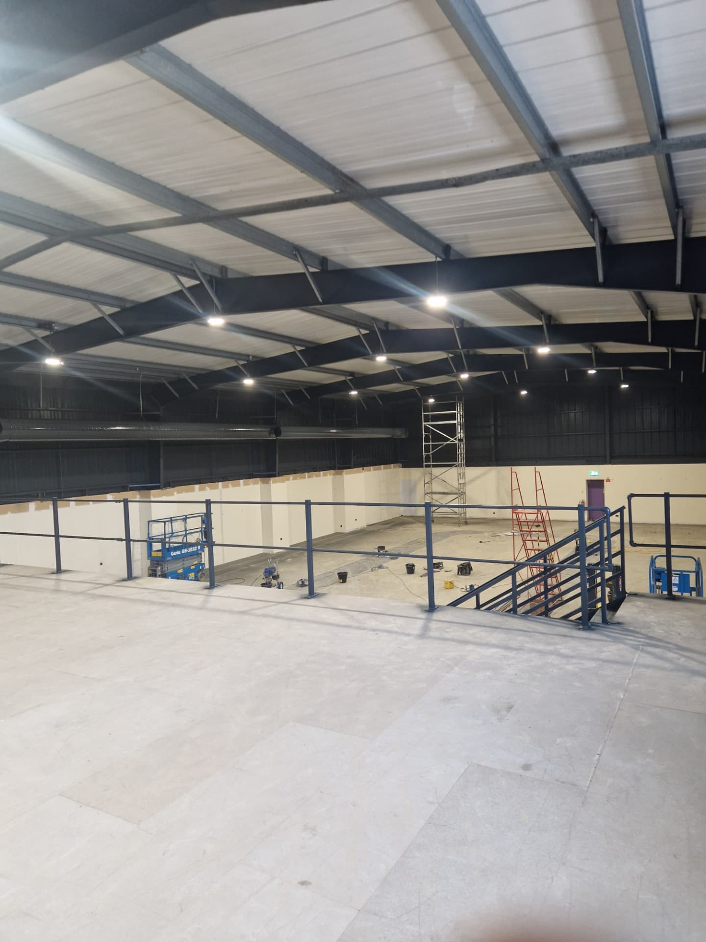 Company-supplied photograph of the X Martial Arts interior mezzanine and steelwork resprayed in anthracite grey