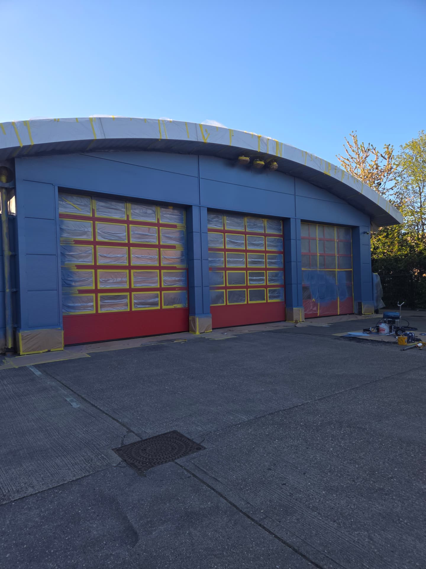 Company-supplied photograph of the ocean blue cladding with the appliance-bay doors still protected during the works
