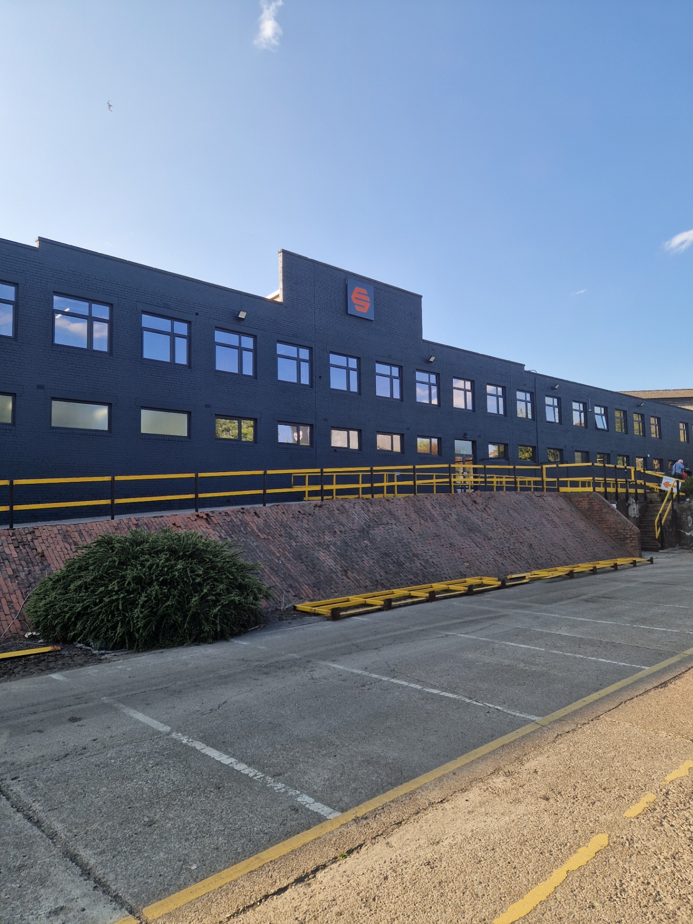 Completed Forged Solutions office block in Sheffield with exterior brickwork resprayed in RAL 7016 anthracite grey