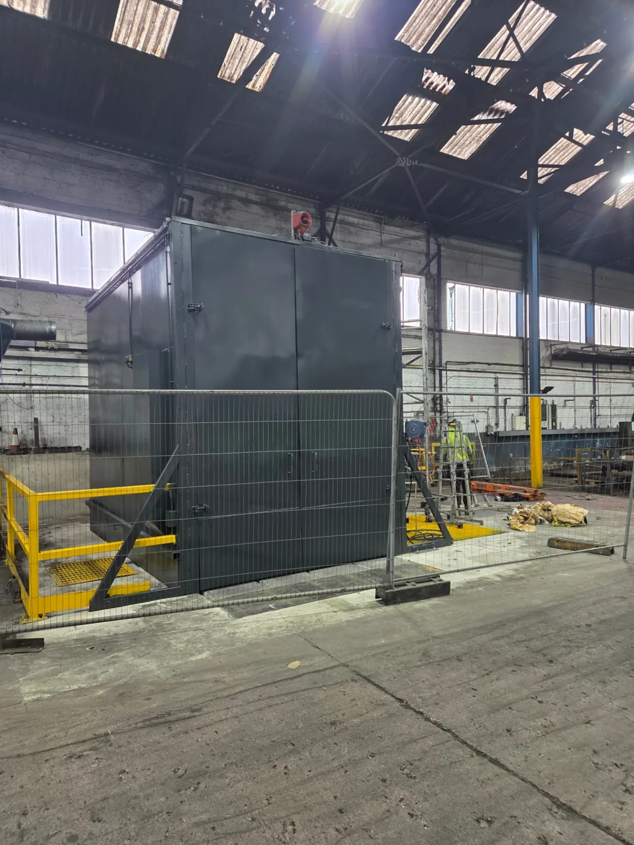 Company-supplied photograph of the completed Forged Solutions container with a RAL 7016 anthracite grey finish